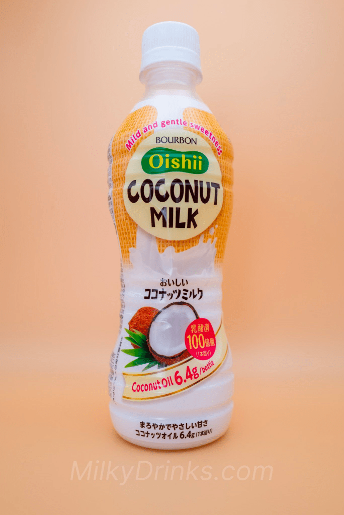 English label of the Bourbon Oishii Coconut Milk drink bottle on a peach background